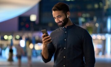 man looking at device